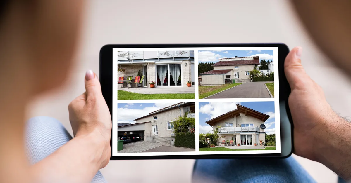 Home buyers browsing property listings online on a tablet